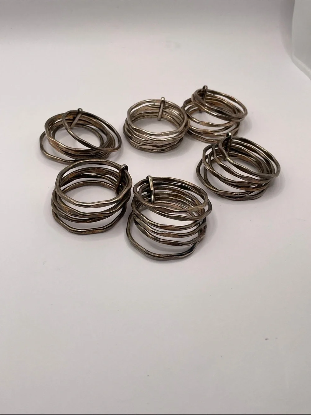 Set of 6 Metal Napkin Rings Tarnished Crome in color